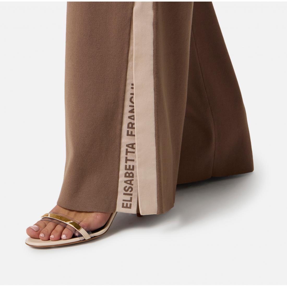 Tuta in maglia con bande in viscosa lucida