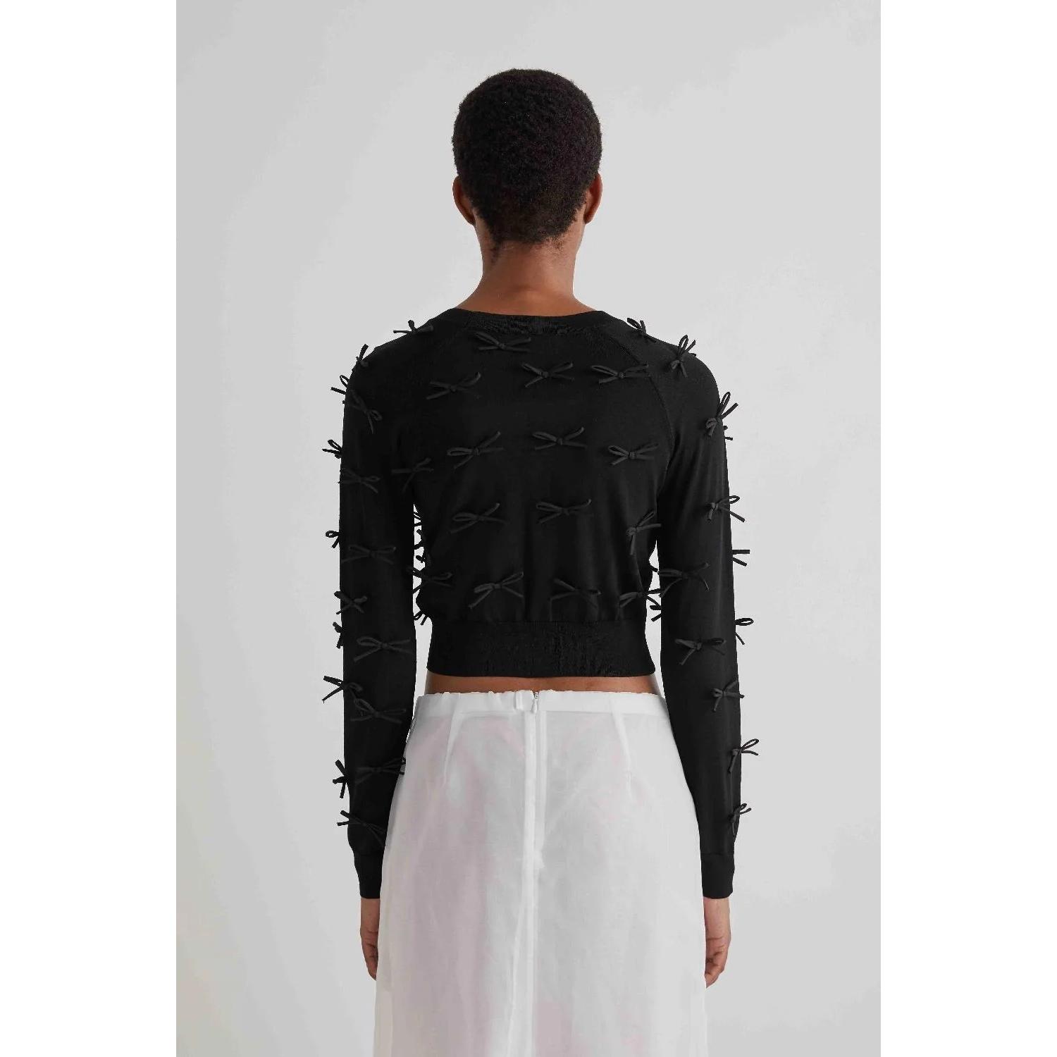 CARDIGAN CORTO CON FIOCCHI APPLICATI