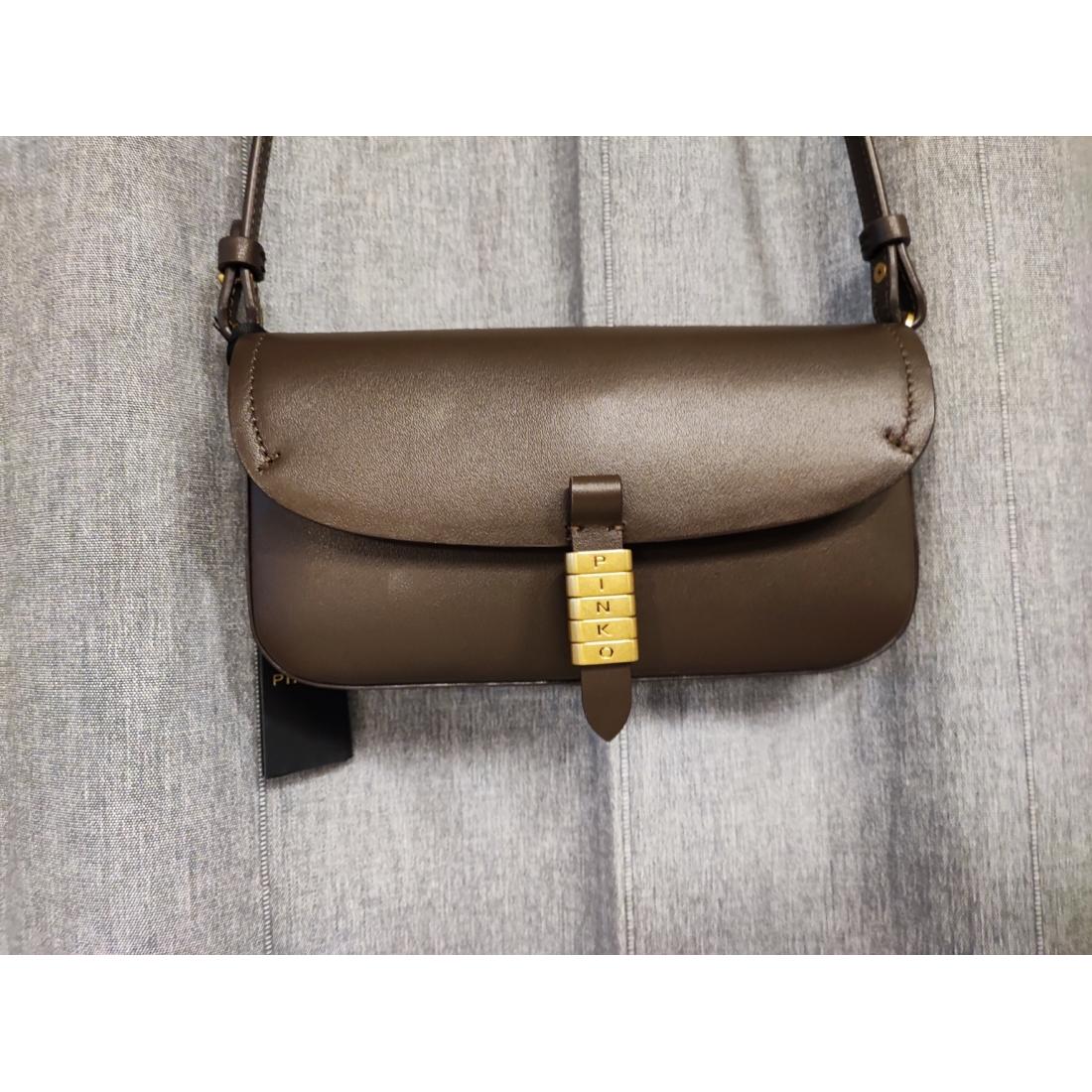 Borsa a spalla media Saddle Flat in pelle