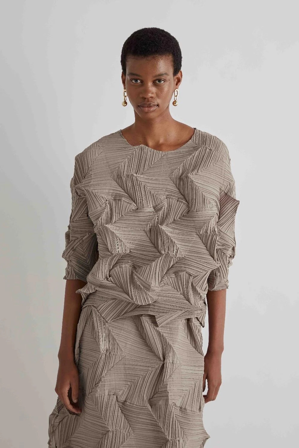 BLUSA PLISSETTATA DISEGNO FISARMONICA