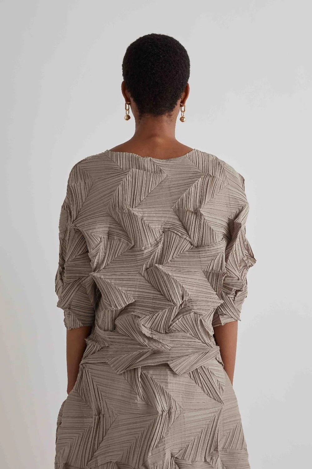 BLUSA PLISSETTATA DISEGNO FISARMONICA