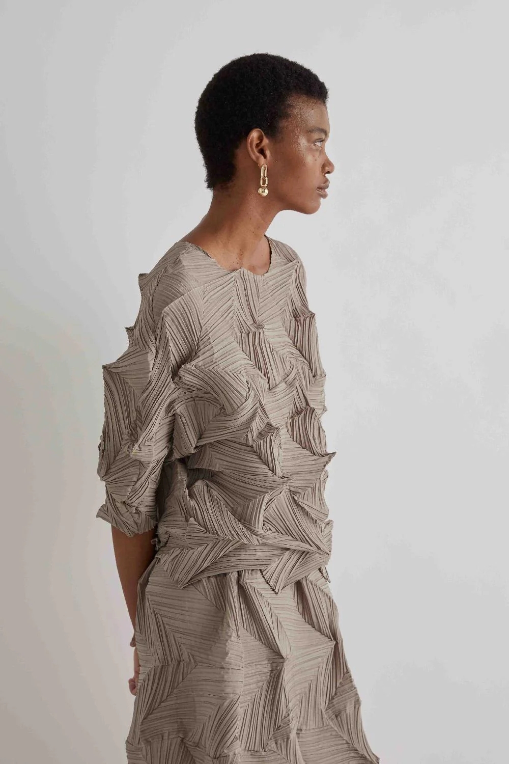 BLUSA PLISSETTATA DISEGNO FISARMONICA