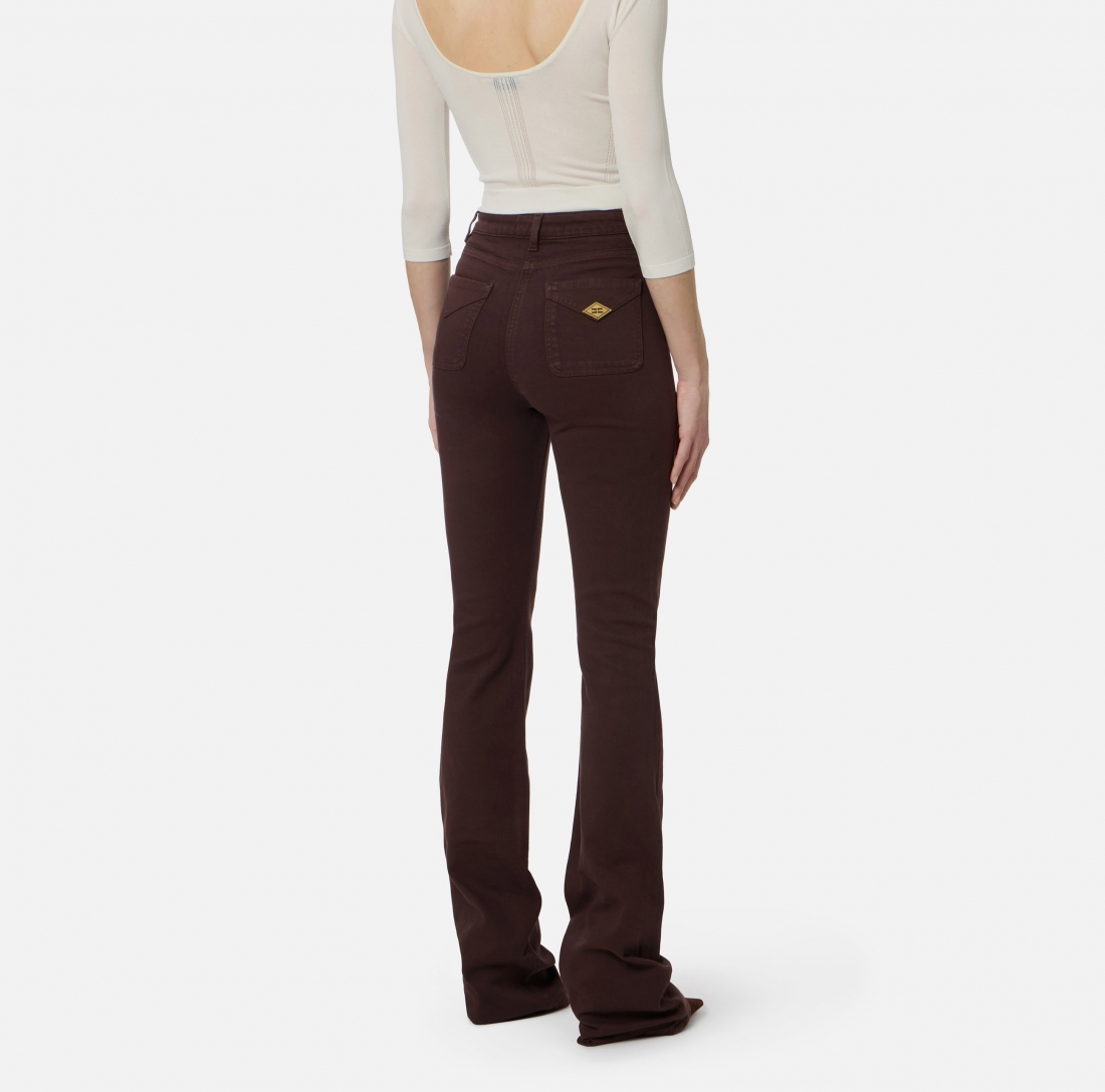 Jeans a zampa con taschini