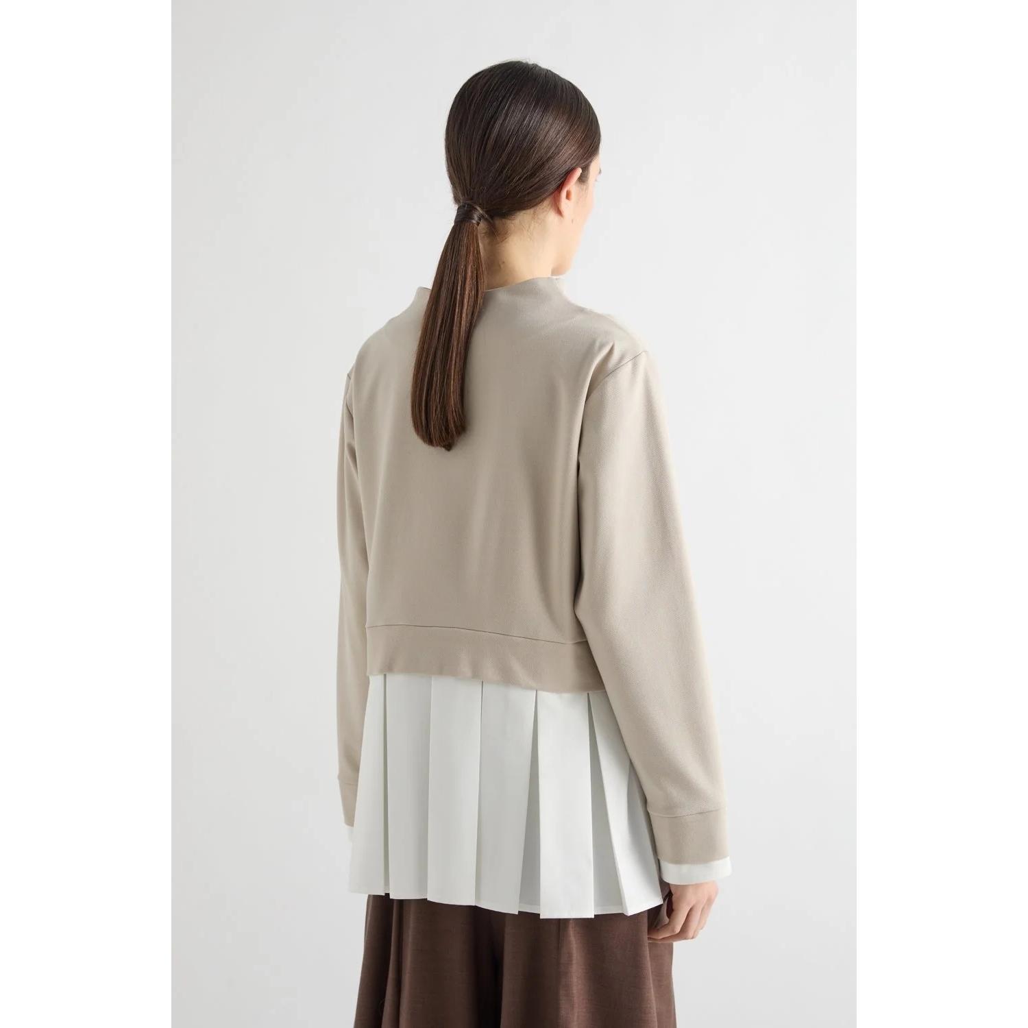 BLUSA CON BALZA PLISSETTATA