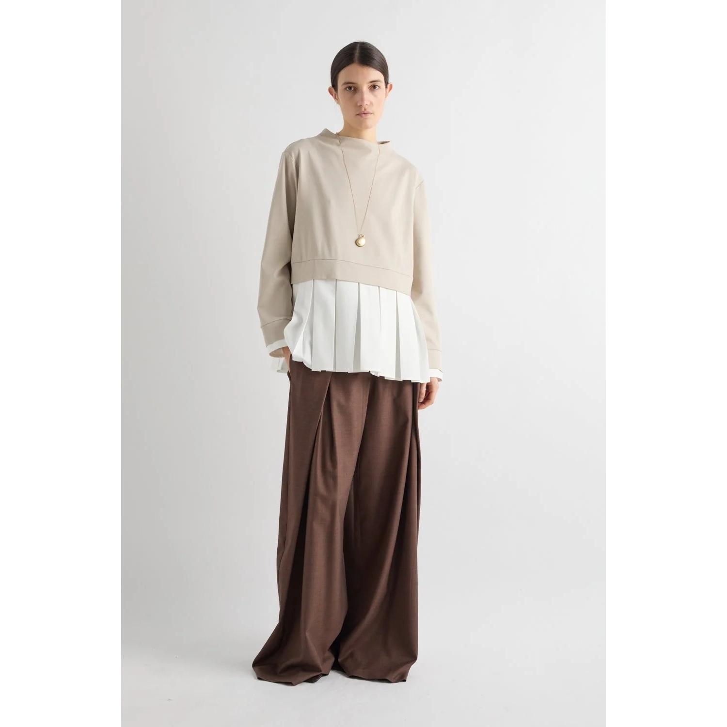 BLUSA CON BALZA PLISSETTATA